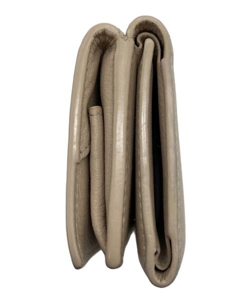 Yves Saint Laurent（イヴサンローラン）Yves Saint Laurent (イヴサンローラン) オリガミタイニーウォレット ベージュの古着・服飾アイテム