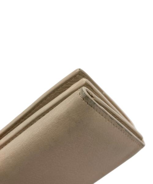 Yves Saint Laurent（イヴサンローラン）Yves Saint Laurent (イヴサンローラン) オリガミタイニーウォレット ベージュの古着・服飾アイテム
