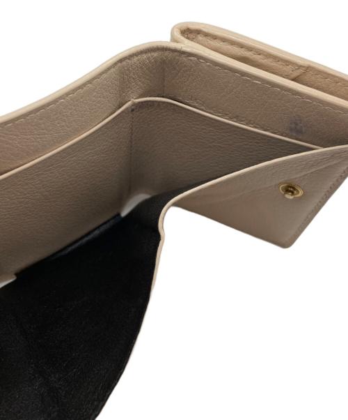 Yves Saint Laurent（イヴサンローラン）Yves Saint Laurent (イヴサンローラン) オリガミタイニーウォレット ベージュの古着・服飾アイテム