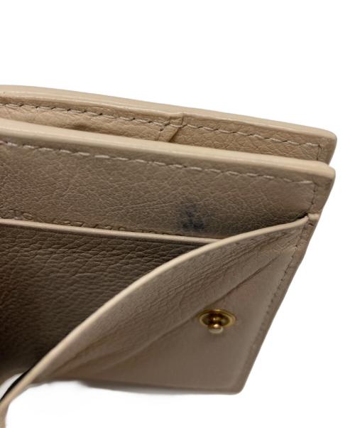 Yves Saint Laurent（イヴサンローラン）Yves Saint Laurent (イヴサンローラン) オリガミタイニーウォレット ベージュの古着・服飾アイテム