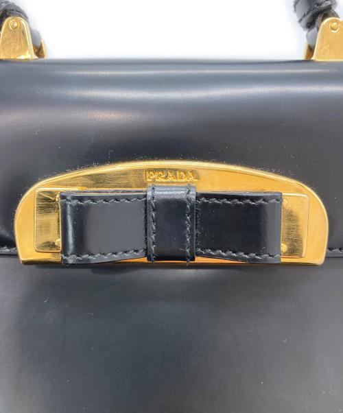 PRADA（プラダ）PRADA (プラダ) リボン パテントレザー ミニハンドバッグ ブラックの古着・服飾アイテム