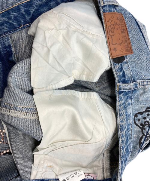 UNIFREE（ユニフリー）UNIFREE (ユニフリー) HELLO KITTY (ハローキティ)  Denim Hot Diamond Wide Leg Pants/コラボデニムパンツ インディゴ サイズ:155/62Aの古着・服飾アイテム