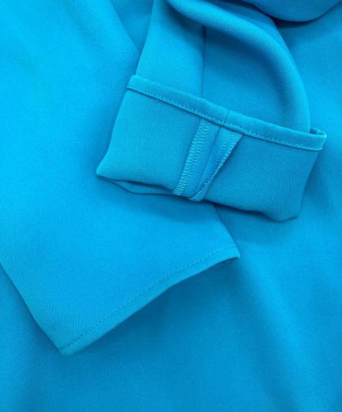 YOKO CHAN（ヨーコチャン）YOKO CHAN (ヨーコチャン) サイドスリットバックティアードブラウス ブルー サイズ:36の古着・服飾アイテム