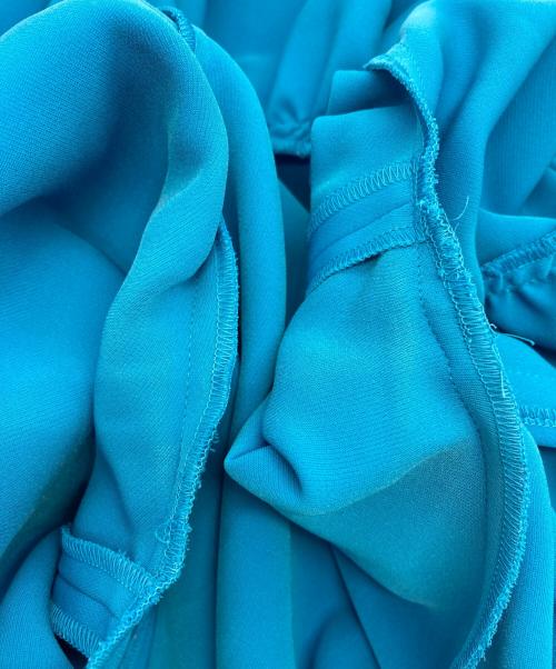 YOKO CHAN（ヨーコチャン）YOKO CHAN (ヨーコチャン) サイドスリットバックティアードブラウス ブルー サイズ:36の古着・服飾アイテム