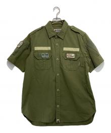 A BATHING APE（ア ベイシング エイプ）の古着「ワッペンミリタリーシャツ」｜カーキ