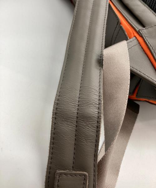 TRION（トライオン）TRION (トライオン) PANEL LIGHT バックパック グレー×オレンジの古着・服飾アイテム