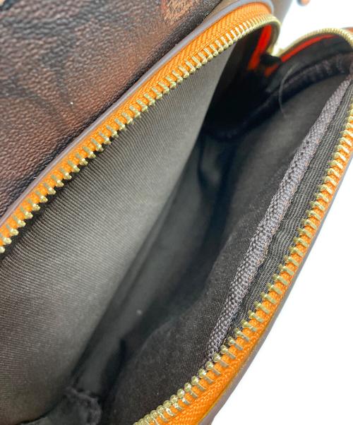 COACH（コーチ）COACH (コーチ) シグネチャーキャンバス・ヘッジホッグ プリントリュック ブラウンの古着・服飾アイテム