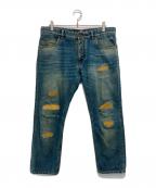 DOLCE & GABBANAドルチェ＆ガッバーナ）の古着「ダメージデザインデニムパンツ」｜インディゴ