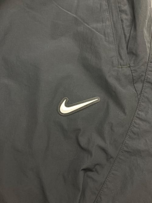 NIKE（ナイキ）NIKE (ナイキ) NOCTA (ノクタ) ノーススター ナイロン トラックパンツ ブラック サイズ:Lの古着・服飾アイテム