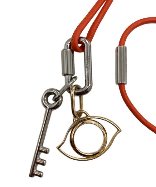 HERMES（エルメス）HERMES (エルメス) キュリオジテ ネックレス オレンジの古着・服飾アイテム