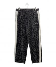 PUMA×SQUID GAME（プーマ×イカゲーム）の古着「コラボベロアトラックパンツ」｜グレー