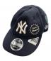 New Era（ニューエラ）の古着「コラボキャップ」｜ネイビー