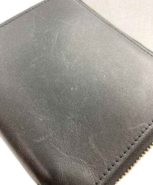 COMME des GARCONS（コムデギャルソン）COMME des GARCONS (コムデギャルソン) 2つ折り財布 ブラックの古着・服飾アイテム