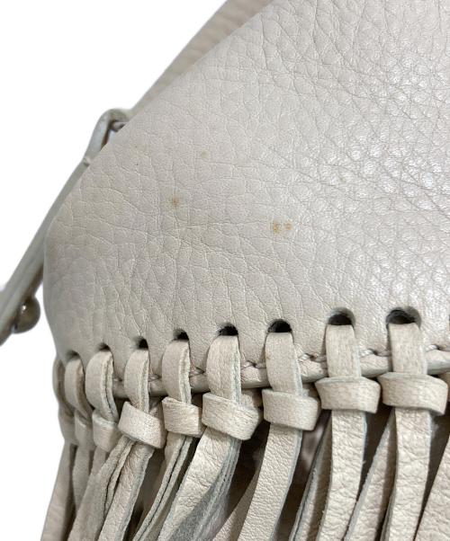 TOD'S（トッズ）TOD'S (トッズ) フリンジトートバッグ アイボリーの古着・服飾アイテム