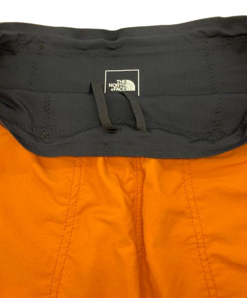 THE NORTH FACE（ザ ノース フェイス）THE NORTH FACE (ザ ノース フェイス) フリーランショーツ オレンジ サイズ:L 未使用品の古着・服飾アイテム