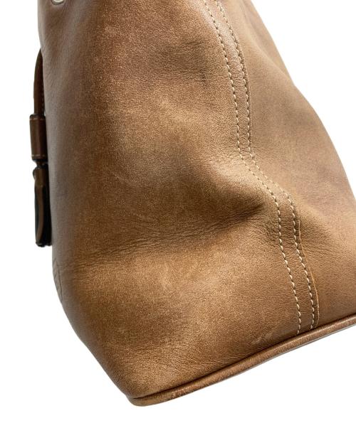 COACH（コーチ）COACH (コーチ) 巾着ショルダーバッグ ブラウンの古着・服飾アイテム