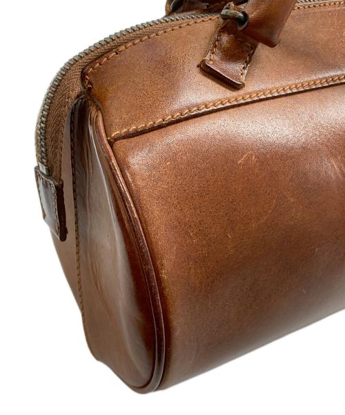 MIU MIU（ミュウミュウ）MIU MIU (ミュウミュウ) ミニドラムバッグ ブラウンの古着・服飾アイテム