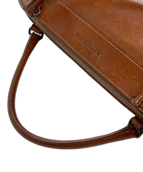 MIU MIU（ミュウミュウ）MIU MIU (ミュウミュウ) ミニドラムバッグ ブラウンの古着・服飾アイテム