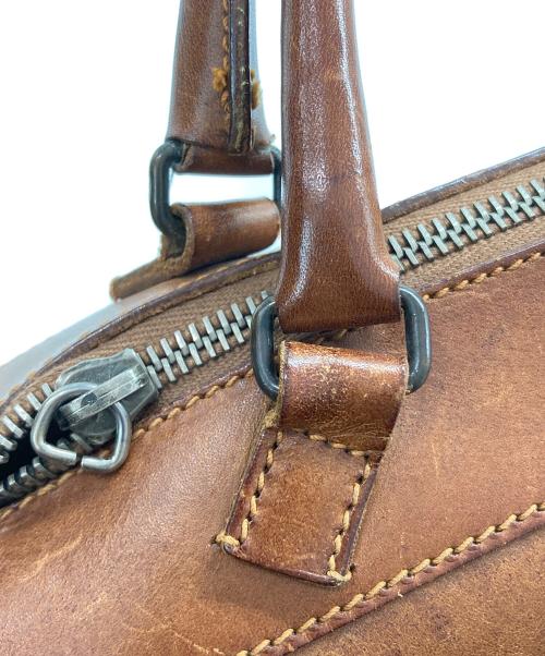 MIU MIU（ミュウミュウ）MIU MIU (ミュウミュウ) ミニドラムバッグ ブラウンの古着・服飾アイテム