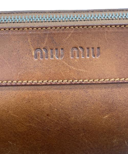 MIU MIU（ミュウミュウ）MIU MIU (ミュウミュウ) ミニドラムバッグ ブラウンの古着・服飾アイテム