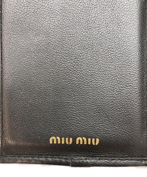 MIU MIU（ミュウミュウ）MIU MIU (ミュウミュウ) マテラッセレザー 　折り財布 ブラックの古着・服飾アイテム