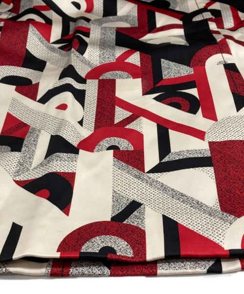 PRADA（プラダ）PRADA (プラダ) レーヨンシルク総柄スカート レッド×ブラック サイズ:40の古着・服飾アイテム