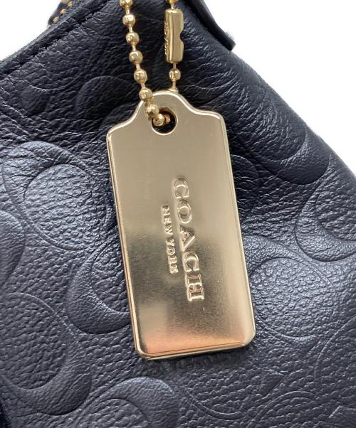 COACH（コーチ）COACH (コーチ) シグネチャー エンボス 2WAYバッグ ブラックの古着・服飾アイテム