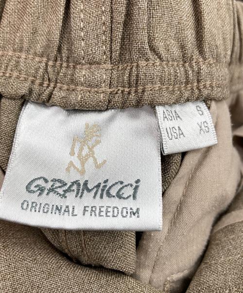 GRAMICCI（グラミチ）GRAMICCI (グラミチ) 2タックワイドテーパードパンツ ベージュ サイズ:Ｓの古着・服飾アイテム
