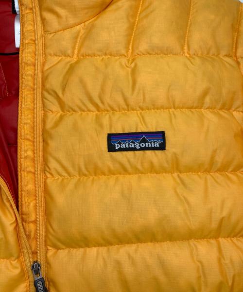 Patagonia（パタゴニア）Patagonia (パタゴニア) 00s Down Sweater Pullover Hoody イエロー×レッド サイズ:UNISEX XSの古着・服飾アイテム