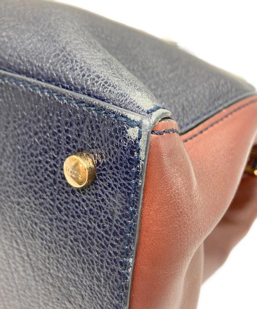 TOD'S（トッズ）TOD'S (トッズ) ハンドバッグ ネイビー×ブラウンの古着・服飾アイテム