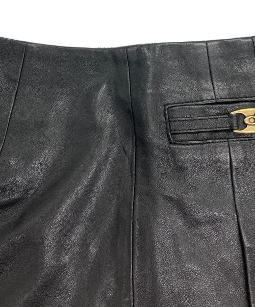 COACH（コーチ）COACH (コーチ) ヘリテージ C レザー ミニ スカート ブラックの古着・服飾アイテム