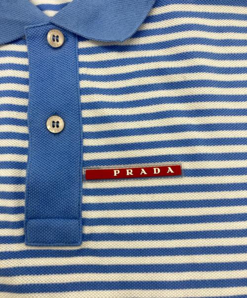 PRADA（プラダ）PRADA (プラダ) ボーダーポロシャツ スカイブルー×ホワイト サイズ:Lの古着・服飾アイテム