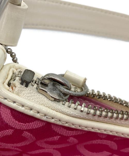 COACH（コーチ）COACH (コーチ) フラワーモチーフ シグネチャー ハンドバッグ ピンク×アイボリーの古着・服飾アイテム