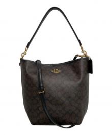 COACH（コーチ）の古着「シティ ラージ バケット バッグ・シグネチャー キャンバス」｜ブラウン×ブラック