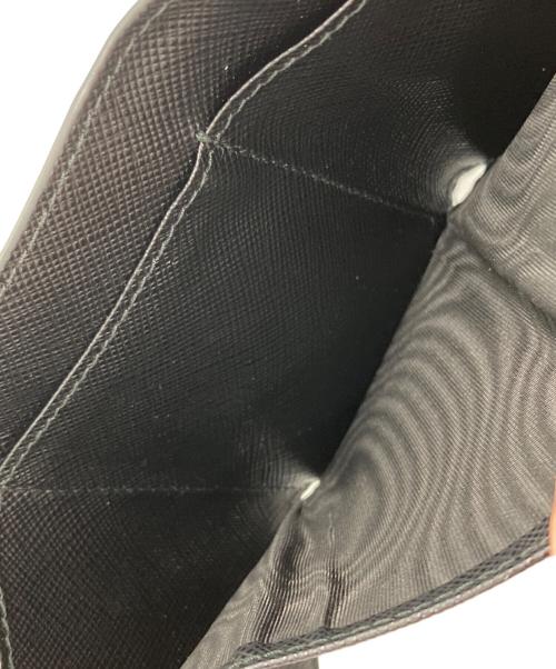 PRADA（プラダ）PRADA (プラダ) SAFFIANO TRIANGOLO TINY  3つ折り財布 ブラックの古着・服飾アイテム