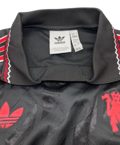 adidas（アディダス）adidas (アディダス) マンチェスターユナイテッドFC LIFESTYLER LS ジャージー ブラック×レッド サイズ:XLの古着・服飾アイテム