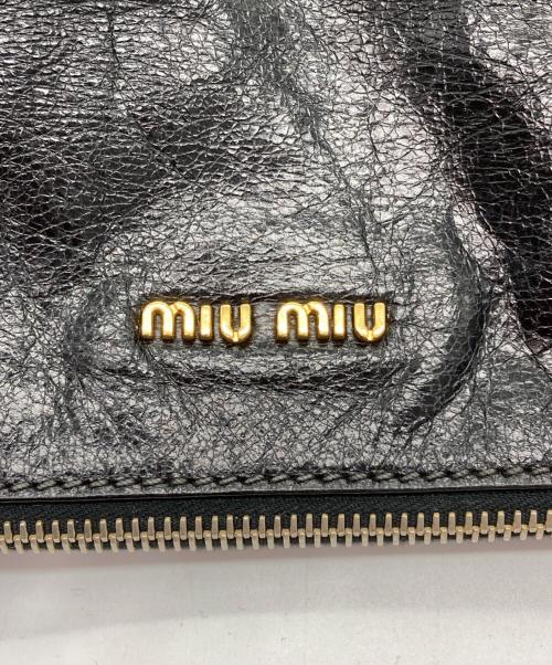 MIU MIU（ミュウミュウ）MIU MIU (ミュウミュウ) VITELLO LUX サイドリボン 2WAYバッグ ブラック×ゴールドの古着・服飾アイテム