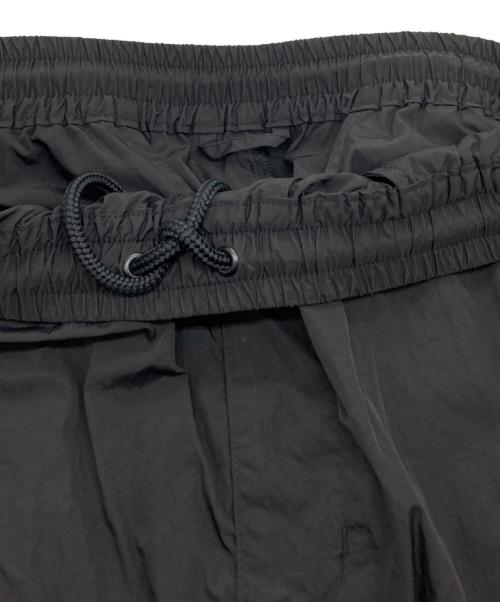 The Ennoy Professional（ザ エンノイ プロフェッショナル）THE ENNOY PROFESSIONAL (ザ エンノイ プロフェッショナル) PIPING NYLON TRACK PANT ブラック サイズ:Lの古着・服飾アイテム