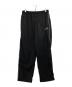 THE ENNOY PROFESSIONAL（ザ エンノイ プロフェッショナル）の古着「PIPING NYLON TRACK PANT」｜ブラック