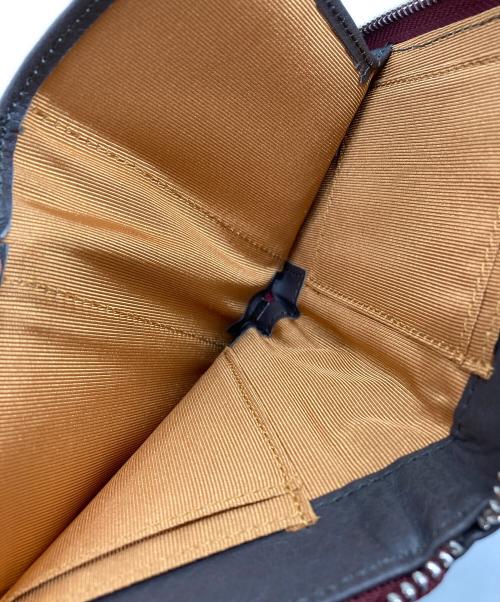 ear PAPILLONNER（イアパピヨネ）ear PAPILLONNER (イアパピヨネ) コラボチャーム付き本革折り財布 グレーの古着・服飾アイテム