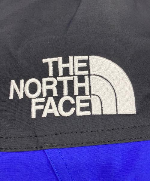 THE NORTH FACE（ザ ノース フェイス）THE NORTH FACE (ザ ノース フェイス) マウンテンダウンジャケット ブルー×ブラック サイズ:Sの古着・服飾アイテム