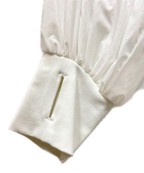 DANSKIN（ダンスキン）DANSKIN (ダンスキン) アンレールライトプルオーバージャケット ホワイト サイズ:Mの古着・服飾アイテム