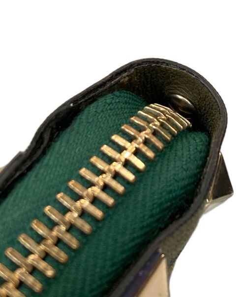 VALENTINO（ヴァレンティノ）VALENTINO (ヴァレンティノ) スタッズラウンドジップウォレット 財布 マルチカラーの古着・服飾アイテム