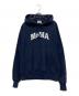 Champion（チャンピオン）の古着「ロゴ刺繍パーカー/MOMA」｜ネイビー