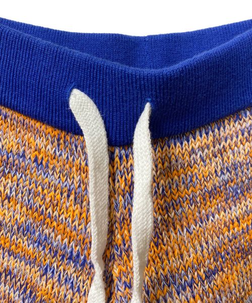 MARCELO BURLON（マルセロバーロン）MARCELO BURLON (マルセロバーロン) CROSS PATCHWORK KINIT PANTS ニットパンツ ブルー×オレンジ サイズ:Mの古着・服飾アイテム