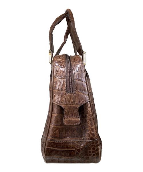 genuine caiman（ジーンカイマン）genuine caiman (ジーンカイマン) クロコダイル本革ハンドバッグ ブラウン サイズ:OneSizeの古着・服飾アイテム