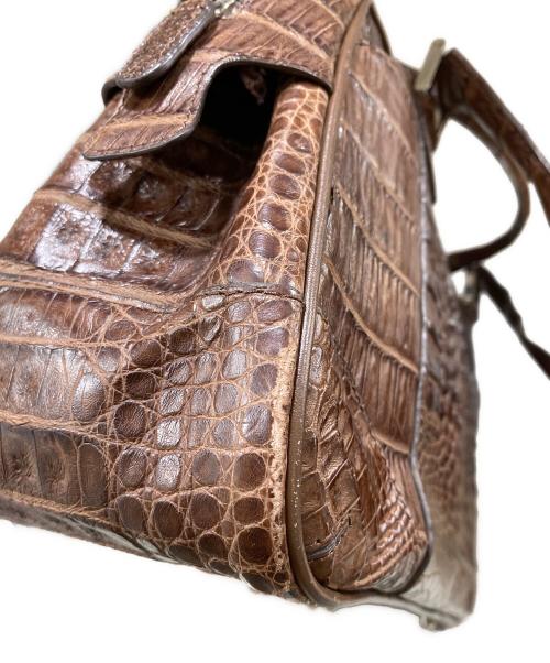 genuine caiman（ジーンカイマン）genuine caiman (ジーンカイマン) クロコダイル本革ハンドバッグ ブラウン サイズ:OneSizeの古着・服飾アイテム