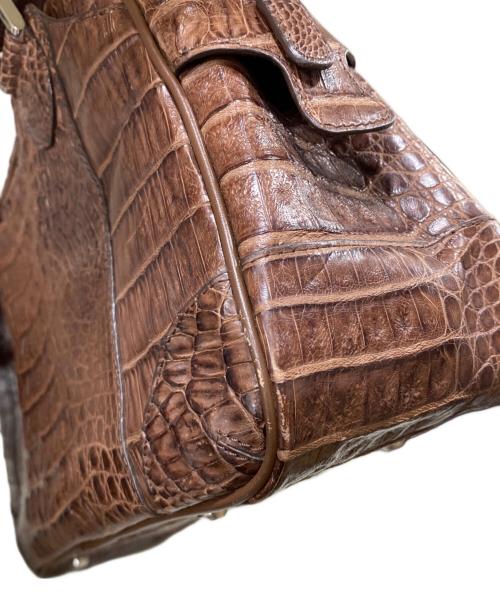 genuine caiman（ジーンカイマン）genuine caiman (ジーンカイマン) クロコダイル本革ハンドバッグ ブラウン サイズ:OneSizeの古着・服飾アイテム