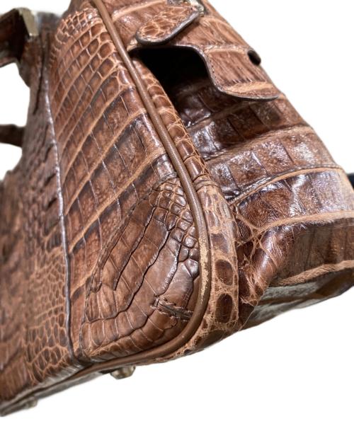genuine caiman（ジーンカイマン）genuine caiman (ジーンカイマン) クロコダイル本革ハンドバッグ ブラウン サイズ:OneSizeの古着・服飾アイテム