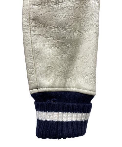 JUNYA WATANABE COMME des GARCONS（(ジュンヤワタナベ コムデギャルソン）JUNYA WATANABE COMME des GARCONS ((ジュンヤワタナベ コムデギャルソン) 断ち切りレザースタジャン ネイビー×ホワイト サイズ:SSの古着・服飾アイテム